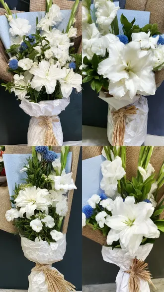 9:16 竖构图，写实花艺摄影，饱满的白色重瓣百合主花，搭配白色紫罗兰、白色剑兰、蓝色乒乓菊、清香木绿叶，花束下部用褶皱白色纸包裹，拉菲草绑成流苏结，背景是浅蓝压纹纸与麻布包装纸，深色暗调背景，柔和室内柔光，花瓣纹理清晰通透，层次丰富，画面干净无文字、无卡片、无水印，8k 高清，细腻质感，低对比度，温柔高级