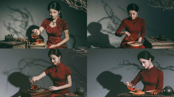 商业级人像摄影，一位优雅的中国年轻女性，身着复古深红色旗袍，梳着整洁的黑色盘发，佩戴细黑玉项链和银色吊坠耳环，正低头温柔地将琥珀色的茶水从玻璃公道杯倒入竹制茶盘上的小茶杯中。茶具置于古朴的实木茶桌上，一旁放着深色铸铁茶壶和木质佛珠。背景为昏暗的素灰色墙面，墙上投射出柔和的扭曲树枝阴影，右上角有枯枝局部。画面呈现宁静的禅意中式茶道场景，采用低调柔和的侧逆光，色调为柔和的暖大地色系。复古胶片人像摄影风格，使用 kodak portra 400 拍摄，带有柔和的胶片颗粒感，浅景深，营造出朦胧的氛围感与电影质感。