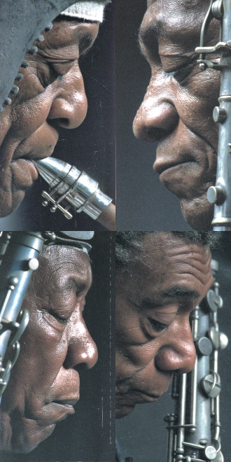 studio hyper-realistic high-resolution close-up: an elderly african american saxophonist, eyes closed in deep concentration. deep facial wrinkles reveal a life and musical journey. the saxophone's polished metal reflects amber-hued light. sweat beads on his forehead reveal high-detail skin texture and pores. a dark velvet backdrop creates a soft, diffuse blur, dimly suggesting the silhouettes of other musicians. dramatic low-key lighting with high contrast accentuates the contours of the face and instrument. shot with a hasselblad x2d 100c camera using an 110mm f/2.8 lens at iso 400. the shallow depth of field achieves extreme isolation, focusing with razor-sharp clarity on the eyes and saxophone. post-processing enhances texture and color with a subtle graininess, evoking an eternal artistic atmosphere.