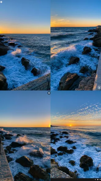 海岸礁石，海浪拍打岩石泛起白色泡沫，海边日落，天空由橙黄渐变到湛蓝色，远处海面，石砌护栏，竖版写实摄影，高清画质，黄昏柔和光影，治愈海景
